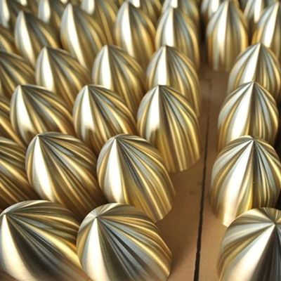 The image shows precision-manufactured copper spun components with polished surface finish, demonstrating high repeatability and surface consistency in batch production.